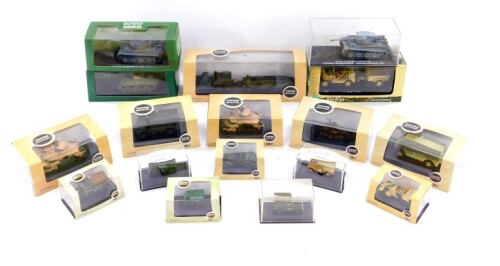 Oxford and Atlas die cast models of military tanks and vehicles, including an M4 Sherman, VI Tiger Tank, jeeps, trailers, field guns, etc., all boxed. (quantity)