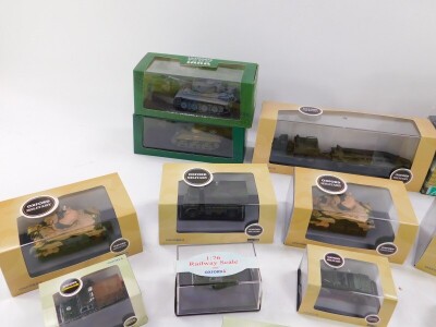 Oxford and Atlas die cast models of military tanks and vehicles, including an M4 Sherman, VI Tiger Tank, jeeps, trailers, field guns, etc., all boxed. (quantity) - 2