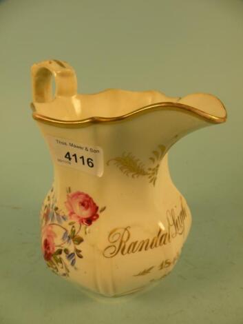 A mid 19thC Staffordshire porcelain jug painted in flowers and