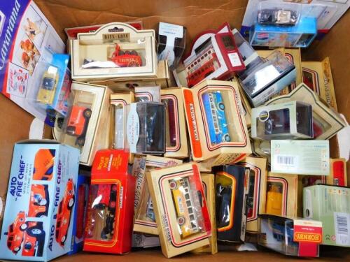 Days Gone By Oxford Hornby and other die cast buses, vintage trucks, cars, etc., all boxed. (quantity)