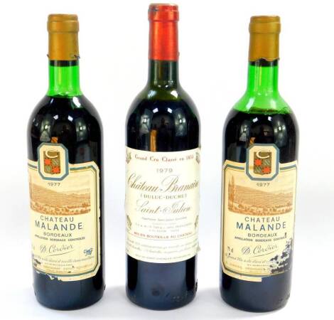 A bottle of Chateau Branaire St-Julian Grand Cru Classe 1979, high shoulder, together with two bottles of Chateau Maland Bordeaux 1977, low neck and mid shoulder respectively. (3)