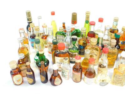 Miniature liqueurs, including gin, brandy, whisky, Creme de Cacal, Grand Marnier, and sherry. (quantity) - 2