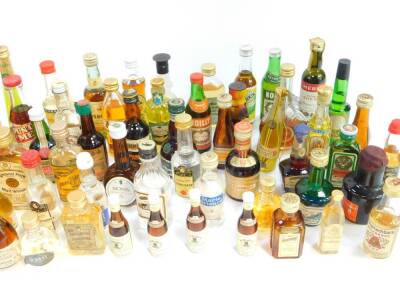 Miniature liqueurs, including gin, brandy, whisky, Creme de Cacal, Grand Marnier, and sherry. (quantity) - 3