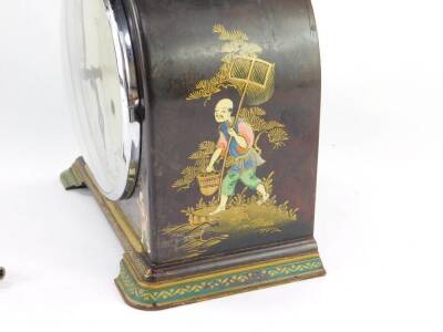 A Smiths Enfield brown Bakelite and japanned lacquered mantel clock, silvered dial bearing Arabic numerals, eight day movement with coil strike, the case decorated with Oriental figures, and a phoenix, with pendulum, with key, 22cm wide. - 2