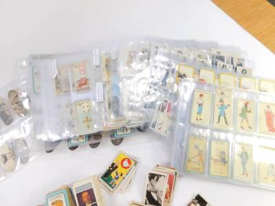 Carerra cigarette cards, part sets including The Nose Game, Tools, Alice In Wonderland, and Fortune Telling, together with further cards. (quantity) - 5