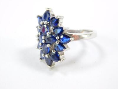 A silver and sapphire floral cluster ring, 4.32 carats, size N, with certificate. - 2