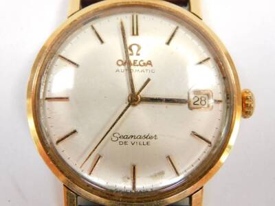 An Omega Seamaster de Ville gentleman's gold plated wristwatch, circular dial with gilt batons, centre seconds, date aperture, on an Omega strap. - 2