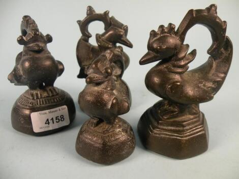 A set of four Tibetan bronze weights