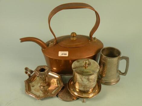 An oval copper kettle