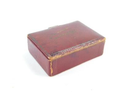 A Patience two pack playing card set, red morocco cased. - 4