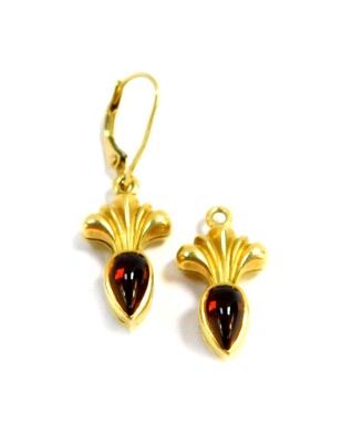 A pair of 18ct gold and gem set earrings, one hook suspension lacking, 7.6g.