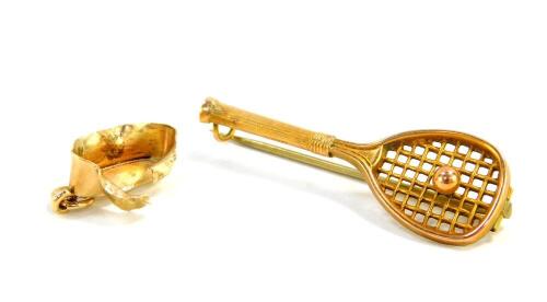 A 9ct gold brooch formed as a tennis racquet and ball, together with a 9ct gold pendant mount, 3.2g all in.