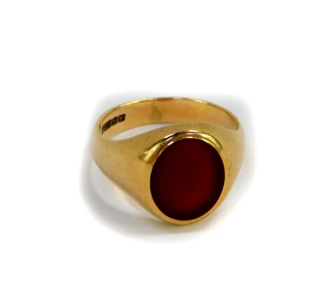 A 9ct gold and Carnelian signet ring, size S/T, 6.6g.