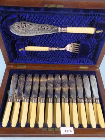 A set of twelve silver plated fish knives and forks and fish servers