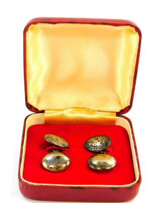 A pair of Charles Horner silver cuff links, of foliate engraved double oval link and chain form, Chester 1898.