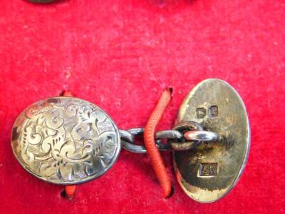 A pair of Charles Horner silver cuff links, of foliate engraved double oval link and chain form, Chester 1898. - 2