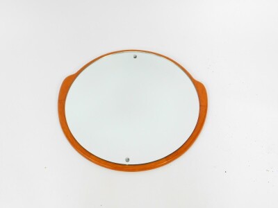 A G-Plan 1960's teak circular wall mirror, 49cm high, 52cm wide.