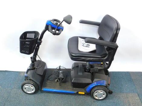 A QL Tech blue mobility scooter, model no QS0848, with battery and user manual.