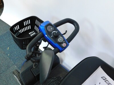 A QL Tech blue mobility scooter, model no QS0848, with battery and user manual. - 2