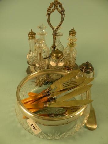 A Victorian silver plated six bottle cruet stand