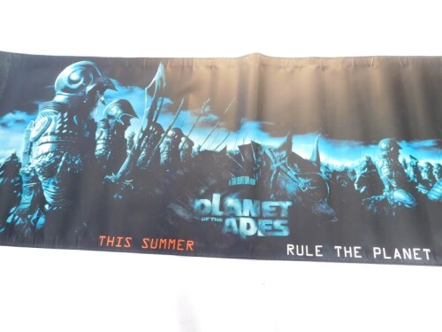 A film banner for Planet of The Apes, This Summer Rule The Planet, 273cm x 90cm.