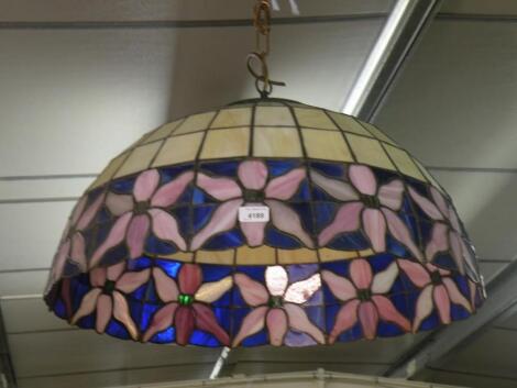 A large Tiffany style stained glass and leaded lampshade