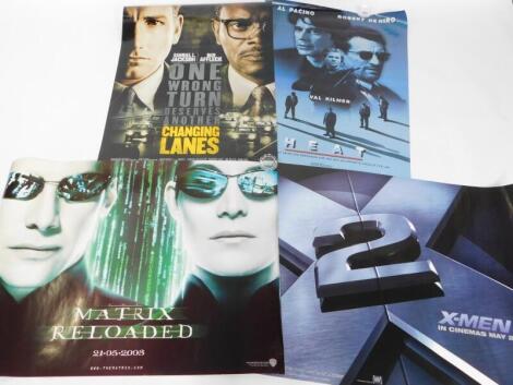 Four film posters, comprising Changing Lanes, X Men II In Cinemas May 2003., The Matrix Reloaded 21st May 2003., and Heat, An Epic Story of Crime Obsession and Two Men On Opposite Sides of the Law.