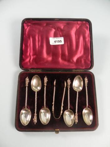 A set of six Victorian silver apostle teaspoons and matching sugar tongs