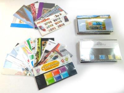 Philately. EII mint commemorative packs, various denominations. (quantity)