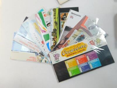 Philately. EII mint commemorative packs, various denominations. (quantity) - 3