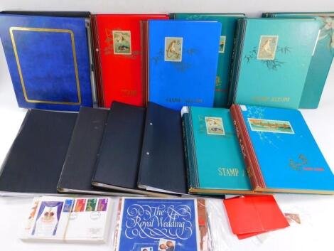 Philately. QV - EII, definitives and commemoratives, mint and used, first day covers, some World stamps, contained in twelve albums, etc.