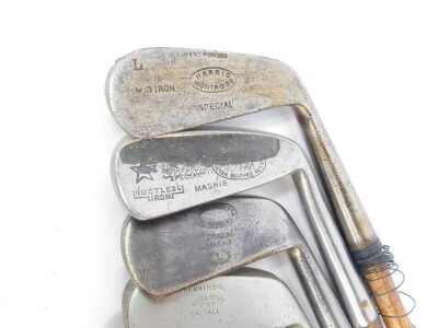 Ten vintage golf clubs, all irons with wooden shafts, to include one for Lilywhites Ltd of London., and one by Harris of Montrose, another by Anderson & Blyth of St Andrews., and another by Hawkin's of Walsall. - 3