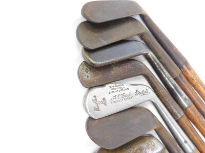 A collection of vintage golf clubs, all irons and wedges with wooden shafts. (41) - 2