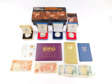 A penny collecting box, and a small collection of Victorian and later pennies, GB coinage pack 1970, four Elizabeth II proof silver commemorative crowns, Edward VII Maundy penny 1902, etc. (1 tray)