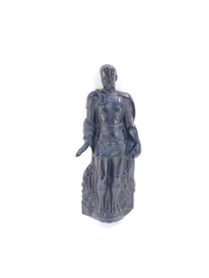 A cast iron wall plaque of a Roman Soldier, modelled standing, 52.5cm high.