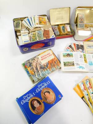 Cigarette tea and other trade cards, in books and loose, sets and part sets, together with Murray's Guides to Cigarette Cards, etc. (quantity) - 2