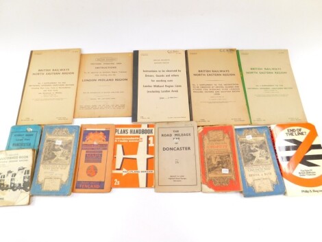 Railway interest. A small collection of British Railways instruction manuals from 1964, 1965, and others, and various cloth backed Ordnance Survey maps, and a street guide and large plan of Manchester and Salford. (quantity)