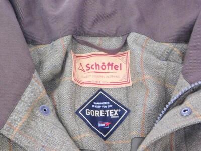 A Schoffel Gor-Tex shooting coat in green herringbone tweed material, size 44 (UK). - 2