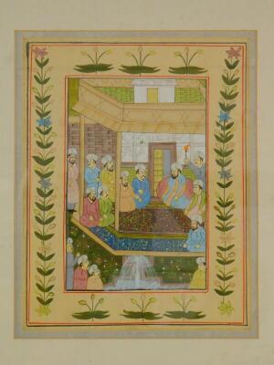 An Indian painting on silk, depicting figures seated on a terrace and in surrounding garden, within a foliate border, painting on silk, 25cm x 20cm.