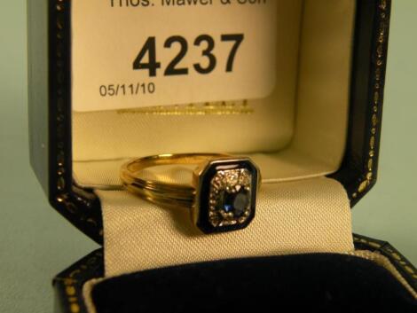 A 14 carat sapphire and enamelled square dress ring retailed