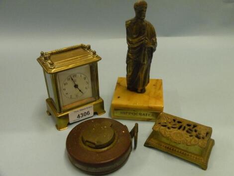 An early 20thC brass alarm clock