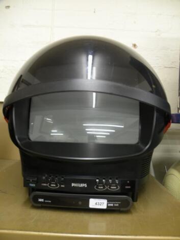 A Phillips colour portable television in the form of a spaceman's helmet