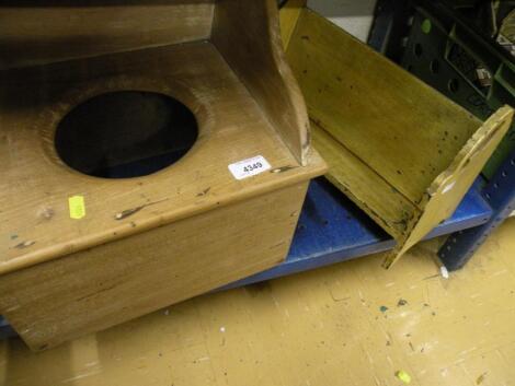 An early 20th century elm child's commode and a a painted book