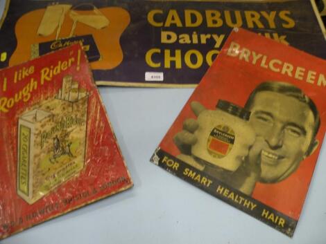 A Cadbury's Dairy Milk tin plate advertising sign and another