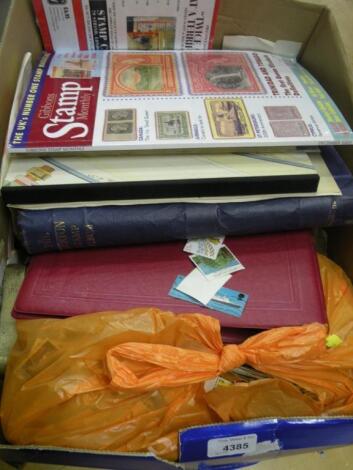 A box of Great Britain stamp albums and some loose stamps