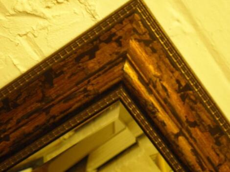 An ornate gilt framed