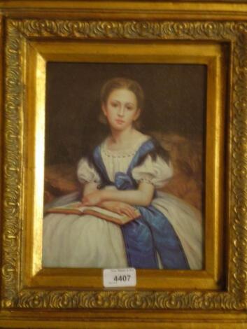 A gilt framed reproduction print on board "Young Maiden Reading"<br