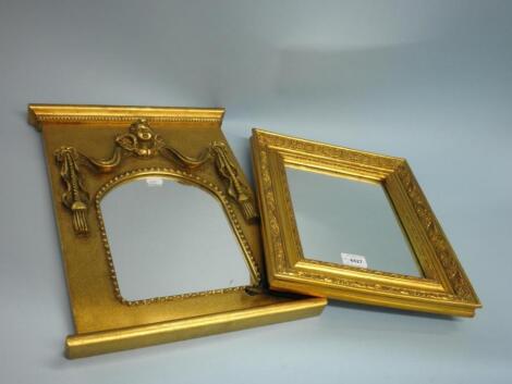 A reproduction gilt wall mirror - cherub mask and another (2)<br