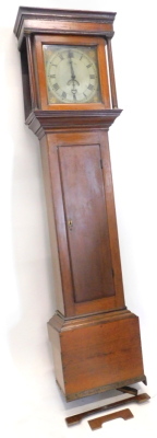 An early 19thC mahogany and oak longcase clock, the square dial painted with patera and with Roman numerals etc., in plain moulded case with cylindrical tapering pillars, lacking plinth, 185cm high, (AF).