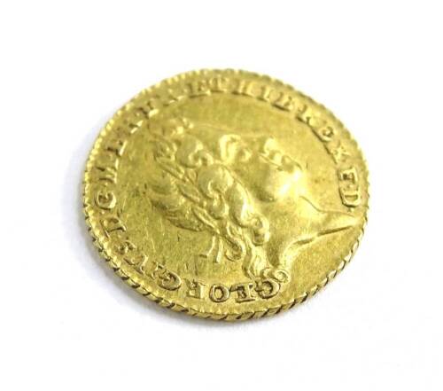 A George I gold quarter guinea, dated 1718, worn.